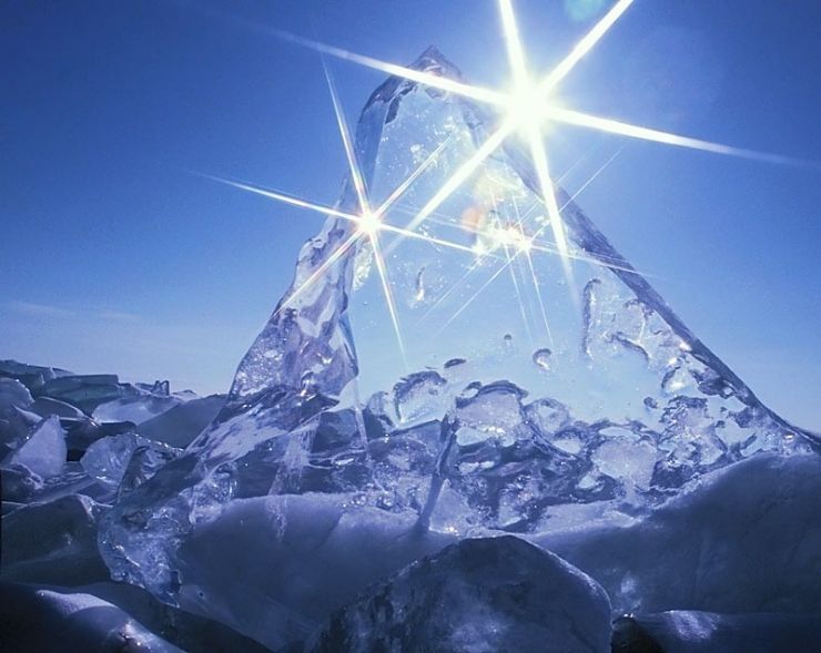 Ледяное солнце. Лед солнышко. Зимнее море. Лед байкала. Лед солнышко.